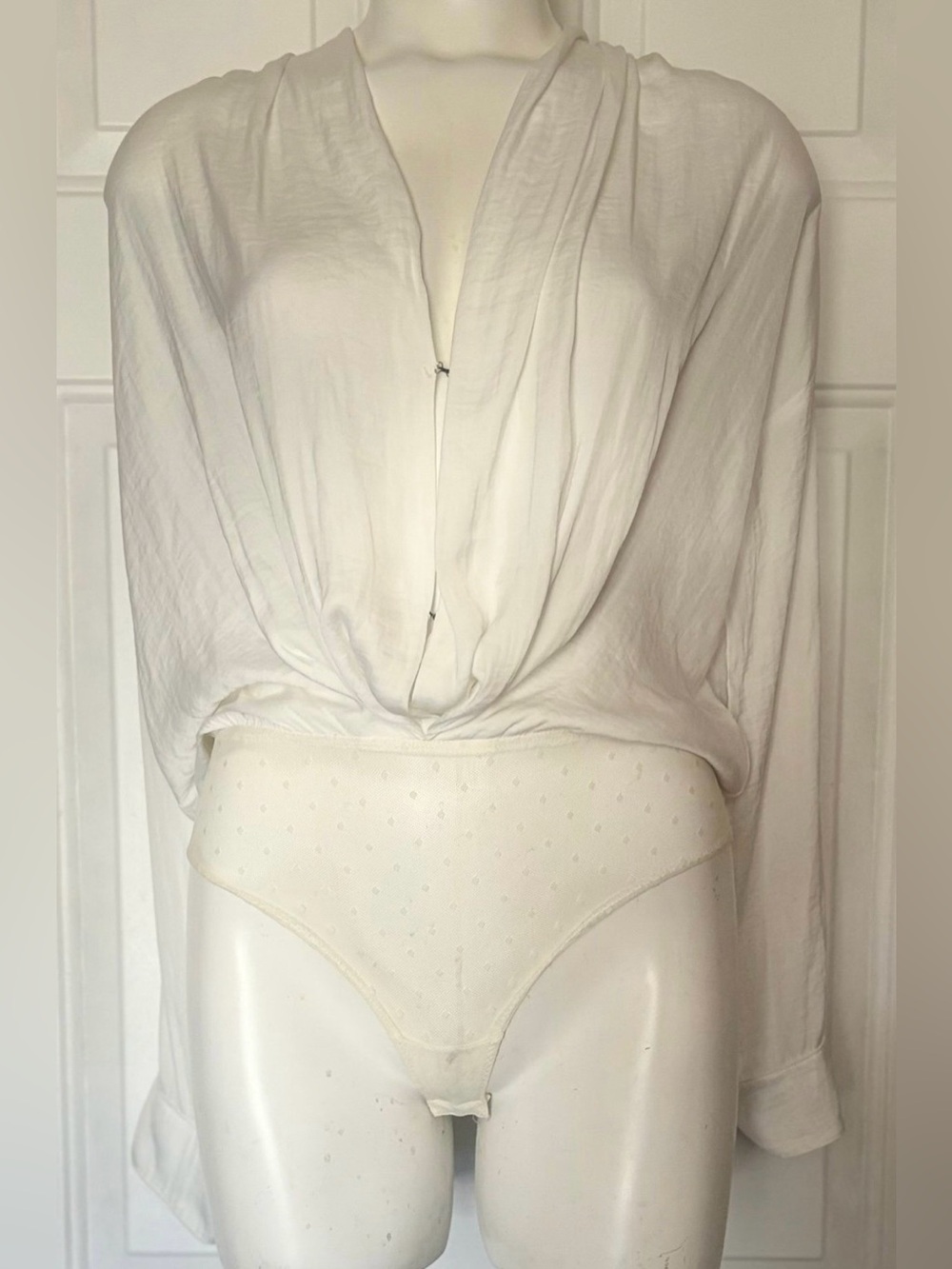 Free People Polyester/spandex blend bodysuit long sleeve wrap style Size Small